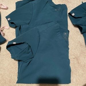 Figs XS Carina one pocket scrub top. Caribbean blue. ONE left